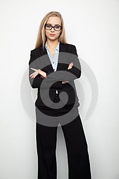 Portrait of a pretty blonde woman in black jacket