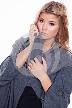 Portrait of a pretty blonde woman in winter style