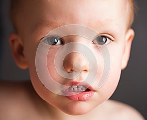 Portrait of pretty brown-eyed boy