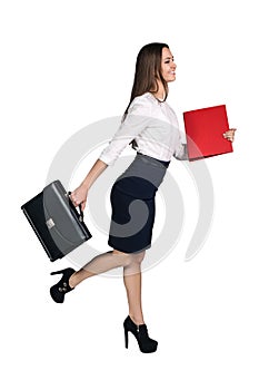 Portrait of a pretty business woman walking