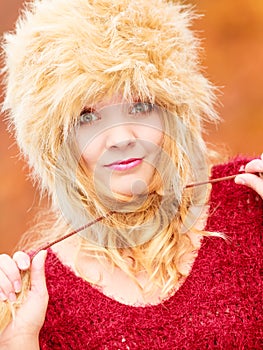 Portrait of pretty fashion woman in fur winter hat