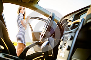 Portrait of a pretty, female teen driver