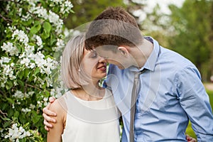 Portrait of pretty girl and boy outdoors