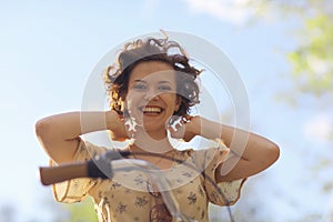 Portrait of a pretty girl in summer park