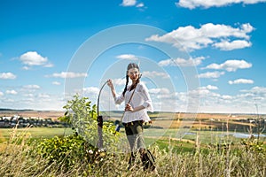 portrait of pretty Indian woman poses in a nature surrounding