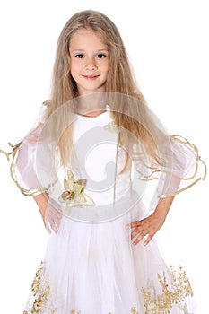 Portrait pretty little girl standing with hands on hips isolated