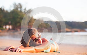 Portrait of pretty long haired woman in bikini having fun at tropical beach. Khao Lak, Thailand