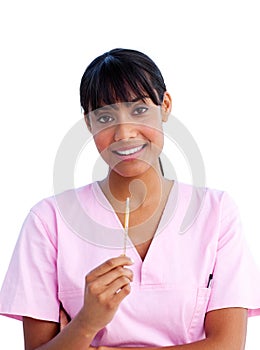 Portrait of a pretty nurse holding a thermometer