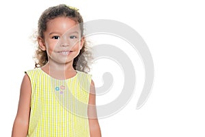 Portrait of a pretty small hispanic girl smiling