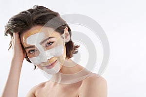 Portrait of pretty smiling woman with face mask