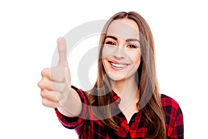 Portrait of pretty smiling young woman gesturing like