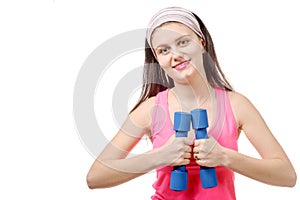 Portrait of pretty sporty girl holding weights isolated on white