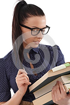 Portrait of pretty student with books