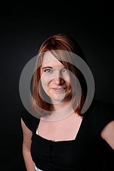 Portrait of pretty teenager with auburn hair