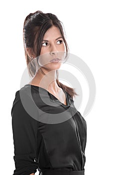 Portrait of pretty woman in black unsure and thinking isolated o