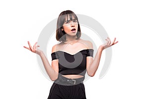 Portrait of a pretty woman shrugging shoulders isolated on a white background