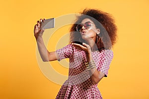 Portrait of a pretty young afro american woman