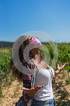 Portrait of pretty young Brazilian woman outdoors