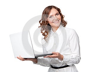 Portrait of a pretty young businesswoman holding a laptop