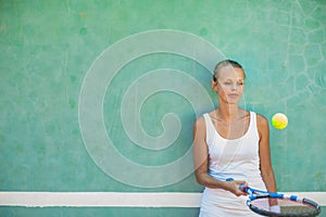 Portrait of a pretty, young, female tennis player