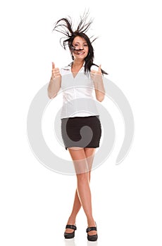 Portrait of a pretty young woman giving you thumbs up