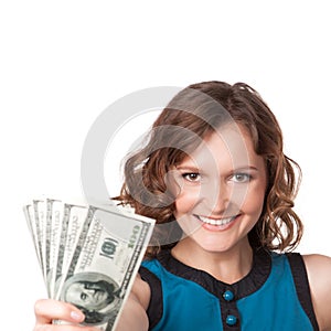 Portrait of pretty young woman holding a fan of dollar bills