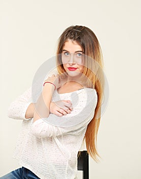 Portrait of pretty young woman with long hair