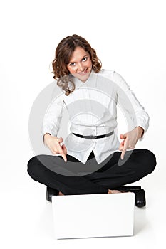 Portrait of a pretty young woman sitting in front of her laptop