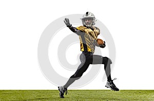 Portrait of professional american footbal player in special uniform isolated over purple studio background photo