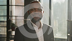 Portrait professional middle-aged African American man smiling business entrepreneur leader banker employer mature happy