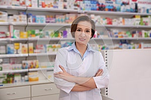 Portrait of professional pharmacist in drugstore