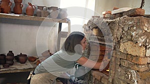 Portrait of professional potter in workshop
