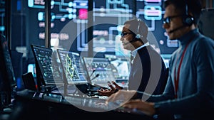 Portrait of Professional IT Technical Support Specialist Working on Computer in Monitoring Control