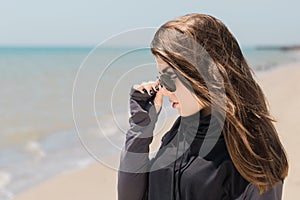 Portrait in profile of a pretty teenage girl