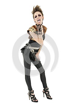 Portrait of punk woman sticking out tongue with rock sign over white background