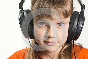 Portrait of purposeful girl with headphones