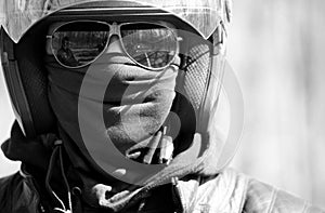 Portrait of racer in helmet on sunglasses