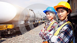 Portrait of Railway industrial workers with a freight train