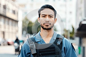 Portrait, ready or policeman in city for law enforcement, community protection or street safety. Face of cop, supervisor