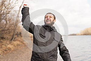Portrait of a real positive man outdoors