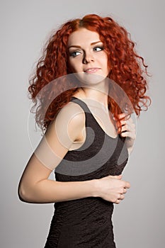 Portrait red haired young woman