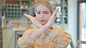 Portrait of Rejection Sign by Young Woman Gesture, Arm