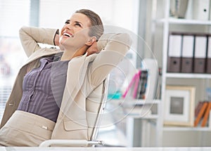 Portrait of relaxed business woman in office