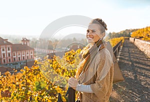 Portrait of relaxed elegant brunette woman in autumn park