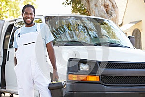 Portrait Of Repairman With Van