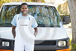 Portrait Of Repairman With Van