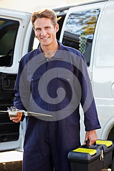 Portrait Of Repairman With Van