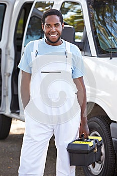 Portrait Of Repairman With Van