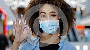 Portrait responsible sick african american woman girl lady with curly hair looking at camera waving finger no putting on