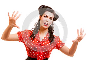 Portrait retro terrified woman in red screaming isolated. Fear.